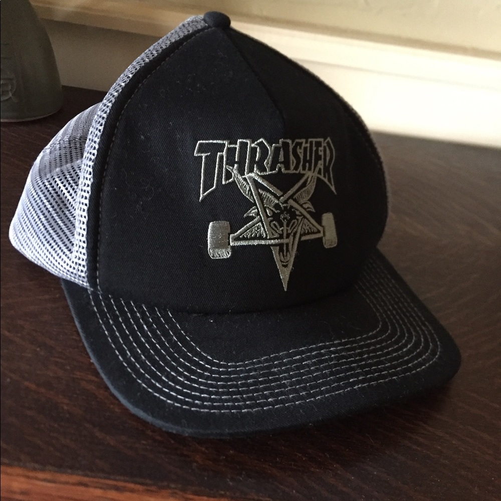 Snap back Thrasher hat.